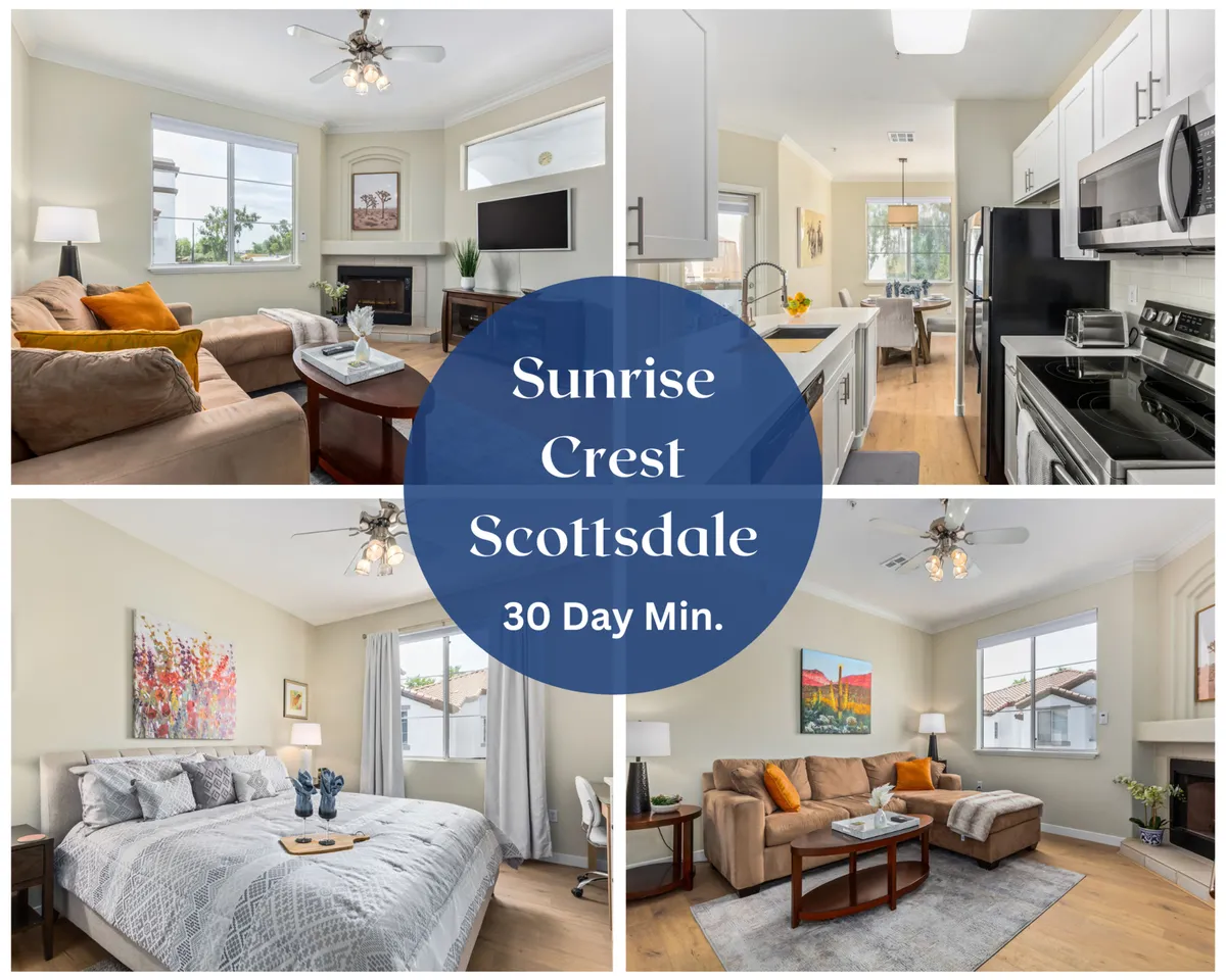 The image features a modern, sun-filled living room with plush seating, seamlessly connected to a contemporary kitchen with stainless steel appliances. Artistic decor and cozy touches create a welcoming, stylish atmosphere ideal for relaxing or entertaining.